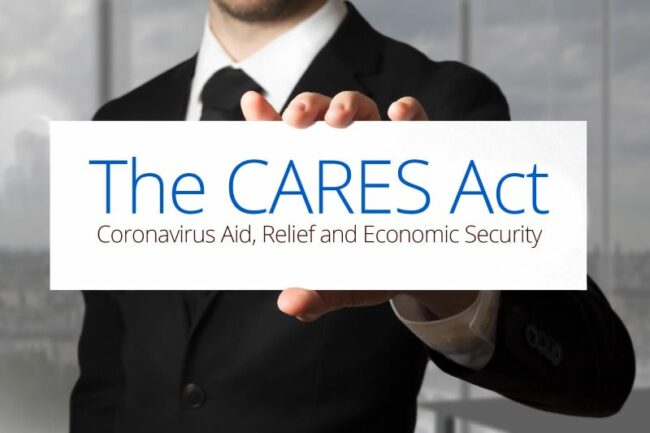 The Cares Act Coronavirus Aid, Relief, and Economic Security text on sign man is holding
